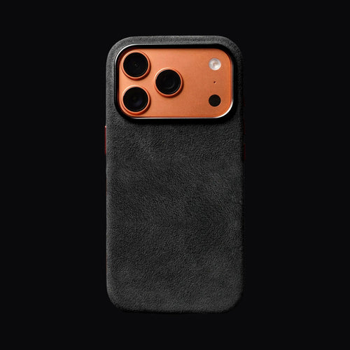 Alcantara Case in black Italian Alcantara with an orange camera surround, on brand black