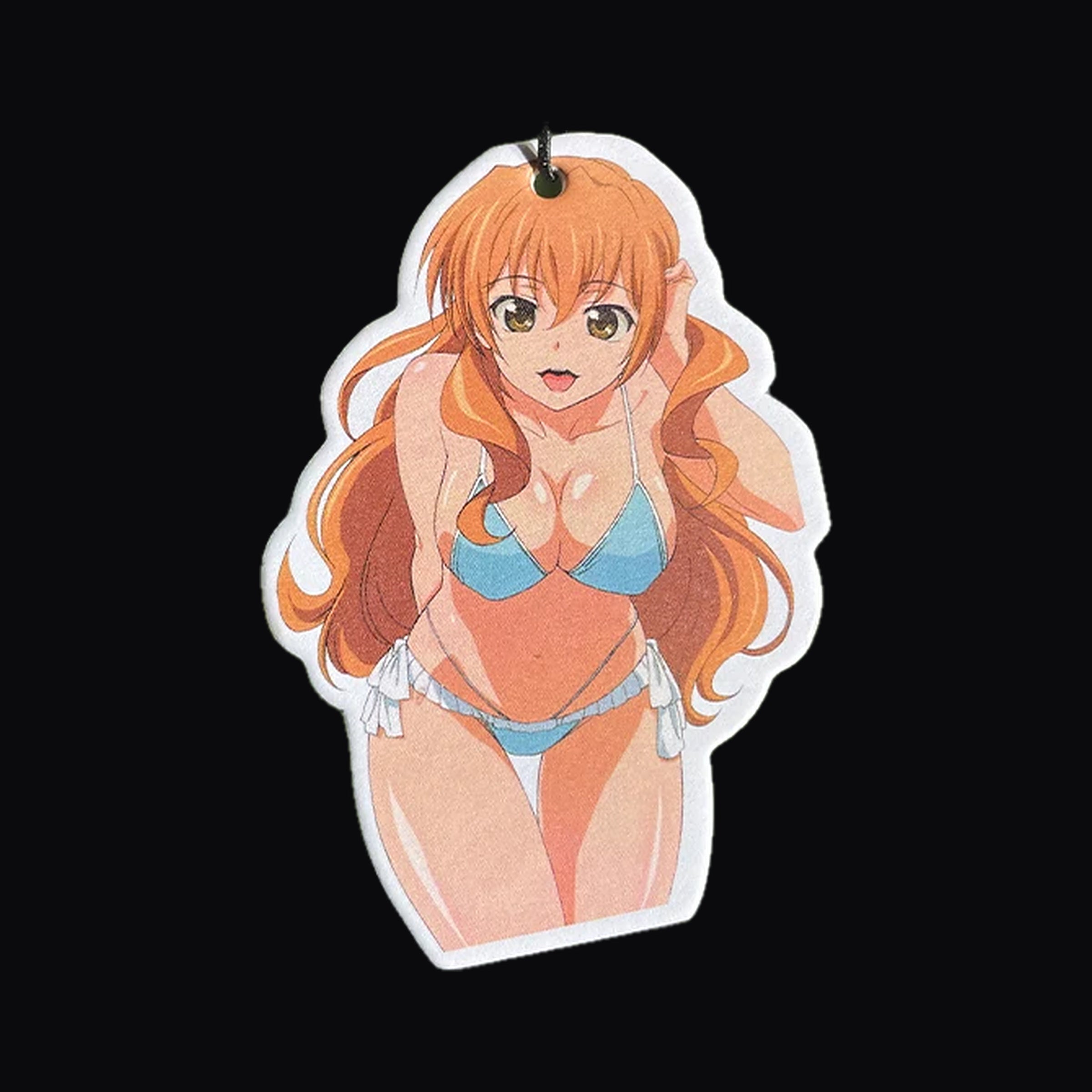 Beach pin up air freshener hanging from a mirror