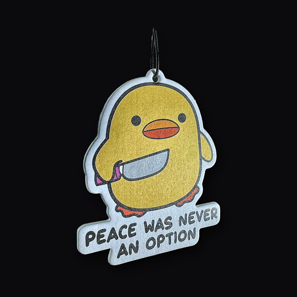 Peace Duck card hanging in a car
