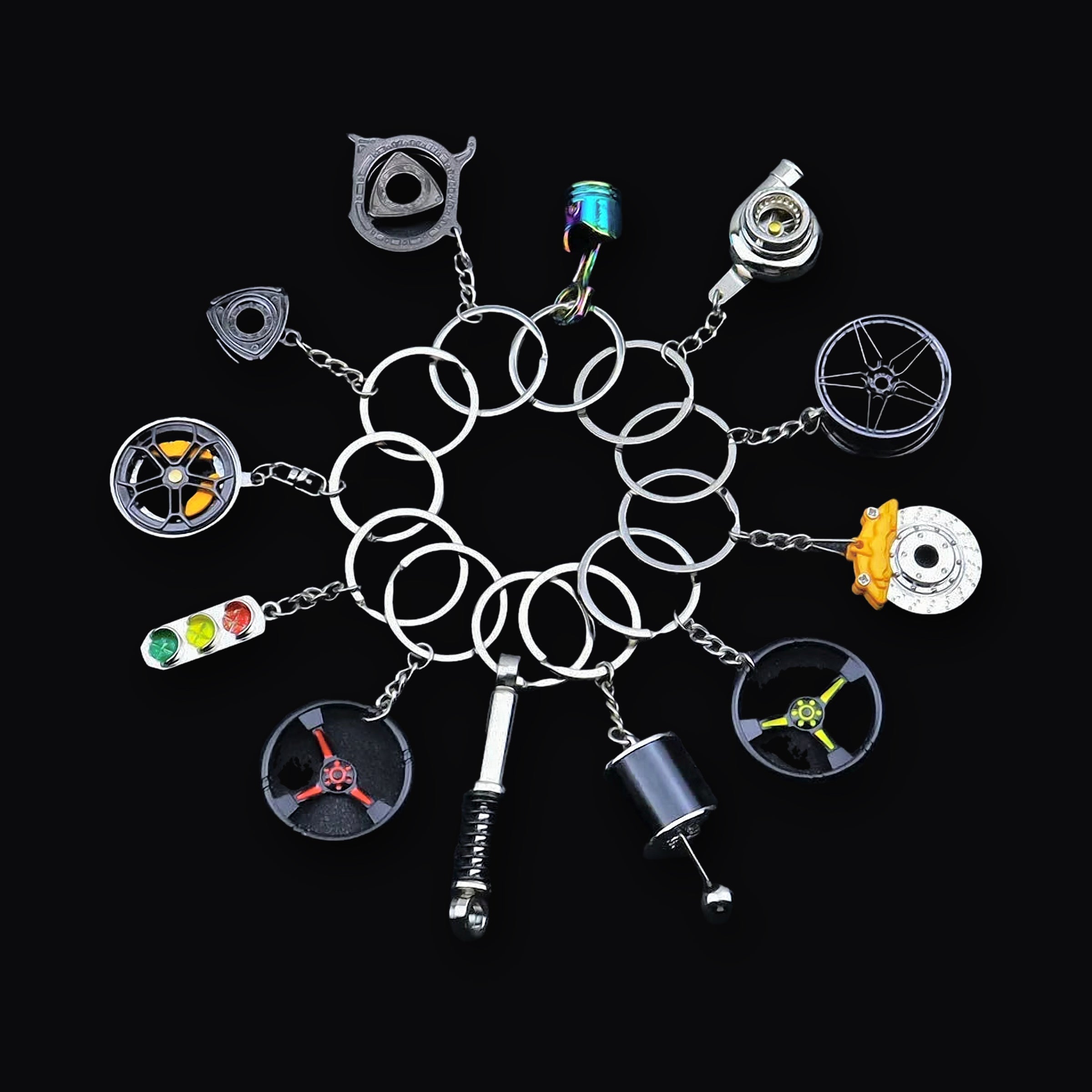 Parts Keyring, twelve miniature car part keyrings arranged in a circle