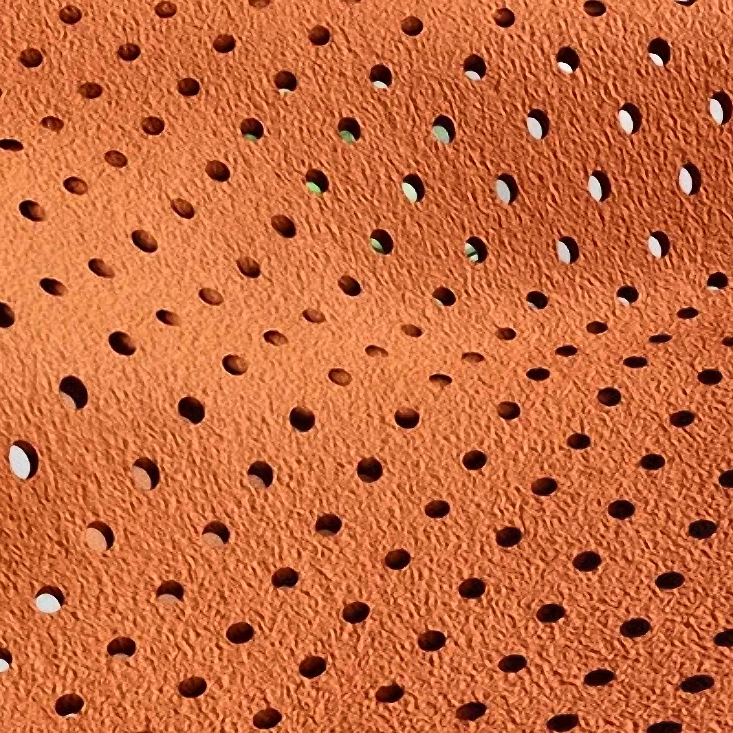 Perforated microsuede cover close up
