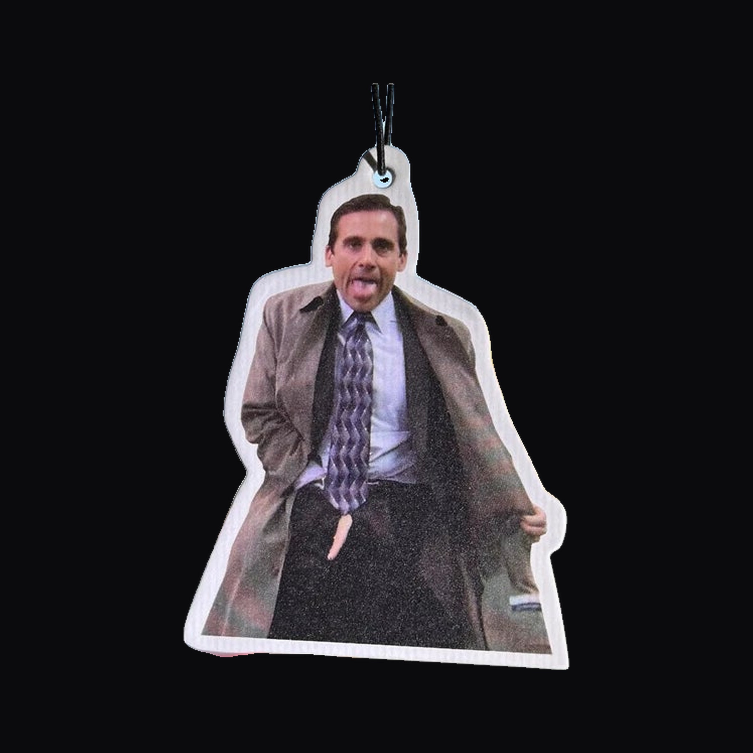 Trench Coat Air Freshener card on its black elastic cord in a car