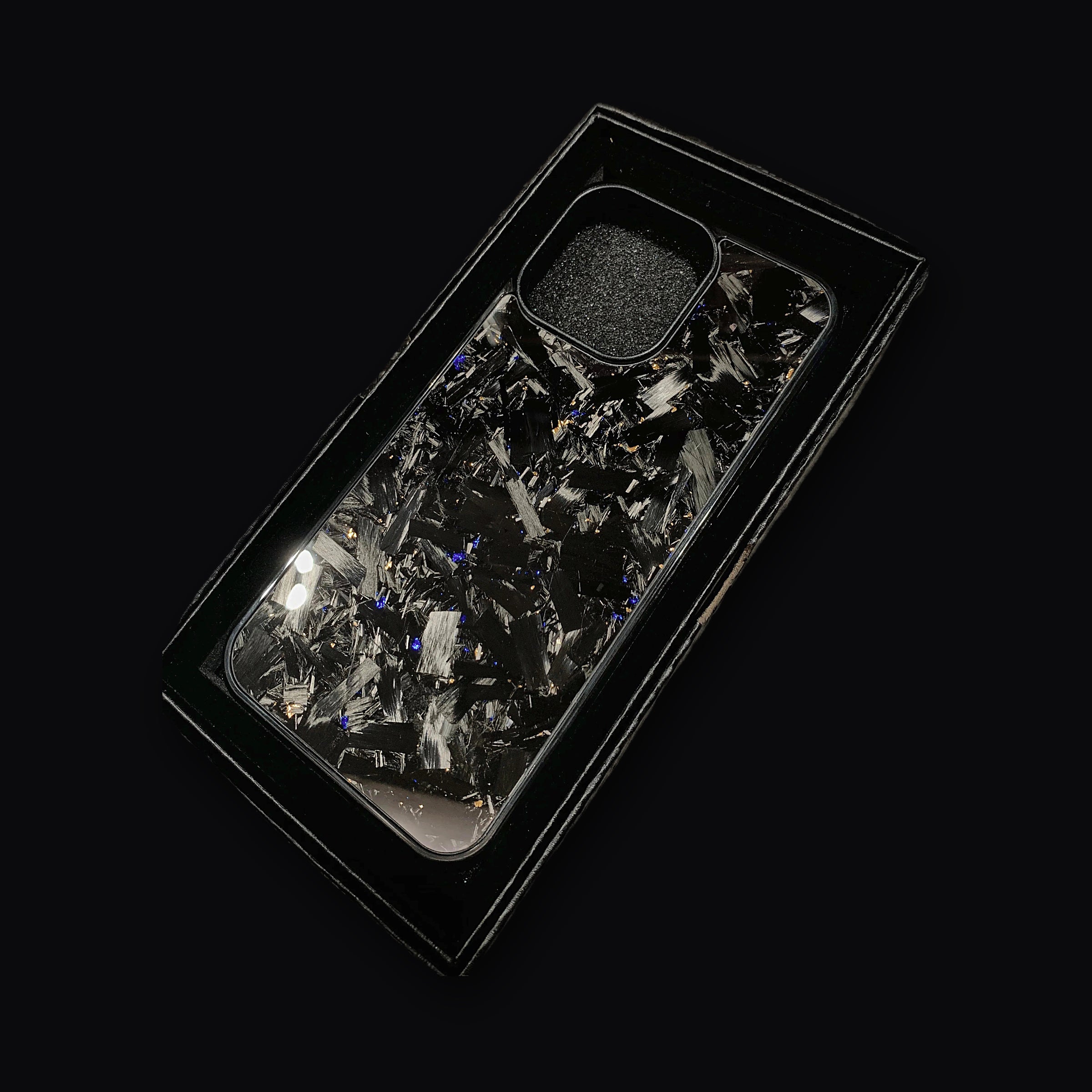 Forged carbon case with the raised camera lip