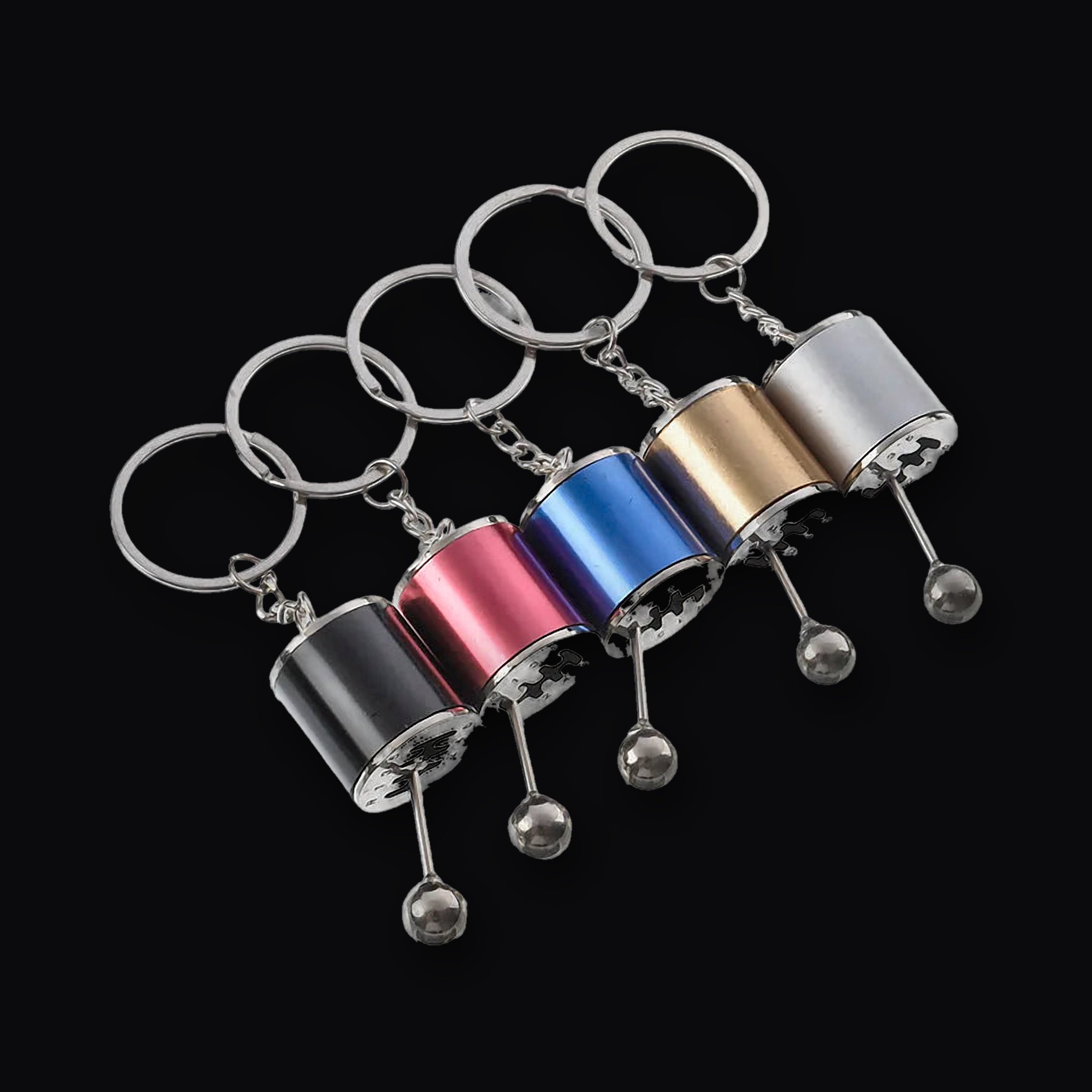 Shifter Keyring shown in five anodised finishes