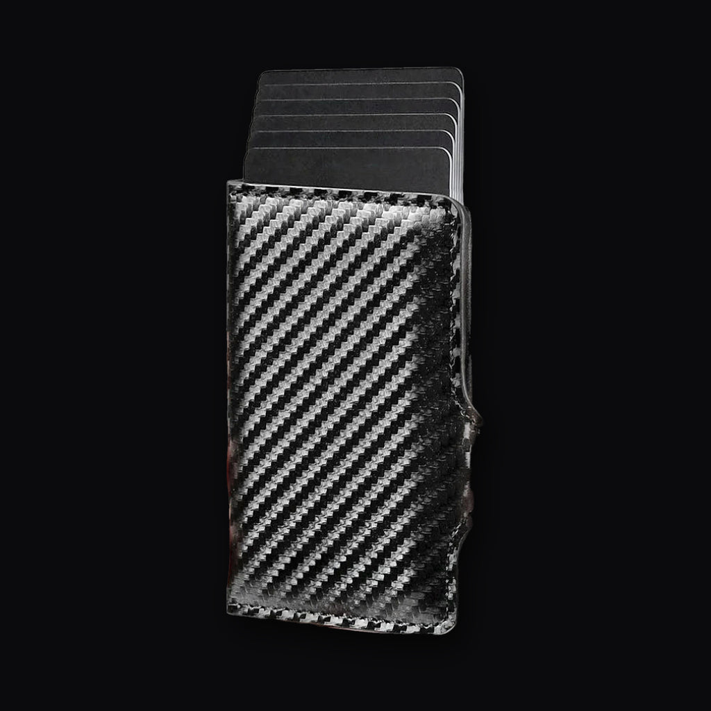 Carbon Card Holder with the cards fanned out of the cassette