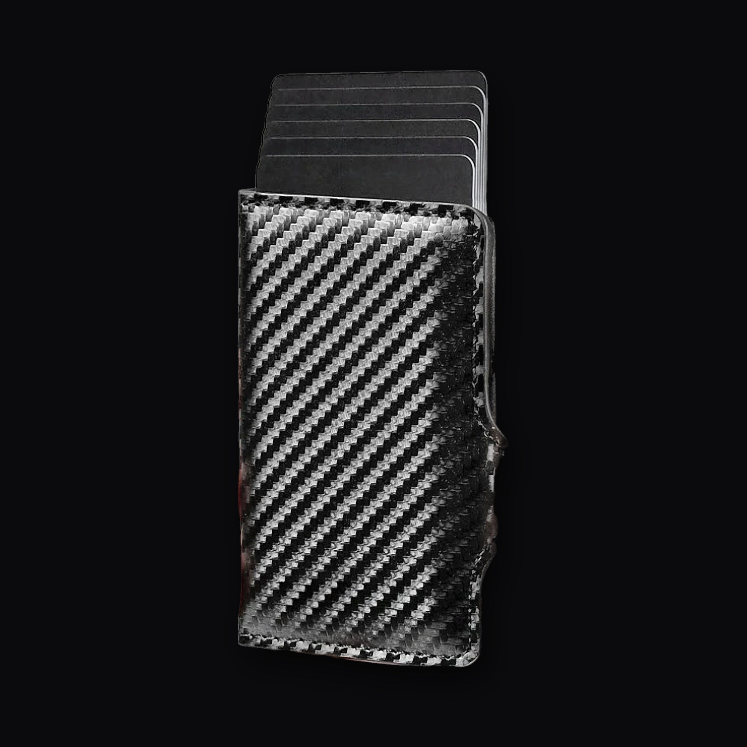 Carbon Card Holder with the cards fanned out of the cassette